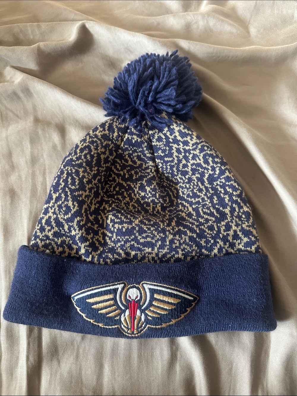 Pelicans Pom Knit Beanie with Wing Emblem